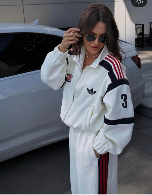 Beautiful Premium zip-up tracksuit featuring contrasting red and white shoulder and side stripes and classic logo FT944